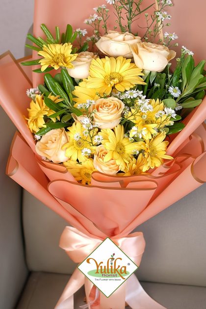 Luna Golden Yellow Gerbera – Yellow gerberas and cream roses in coral wrap | Yulika Florist Jakarta